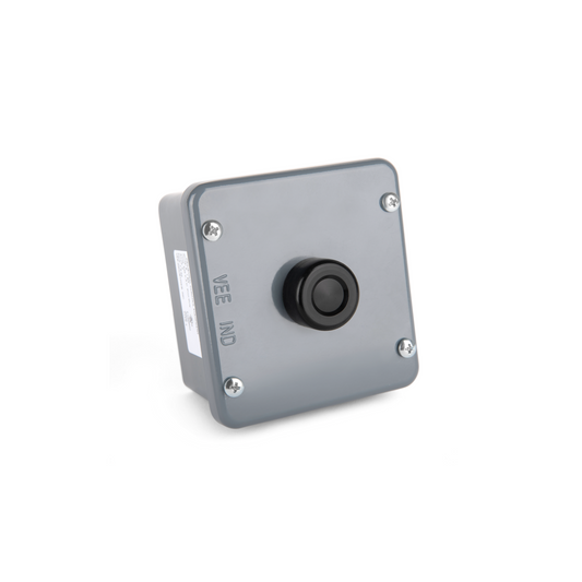 A black push button in a sturdy grey metal housing with a heater. Part Number: 1 BX